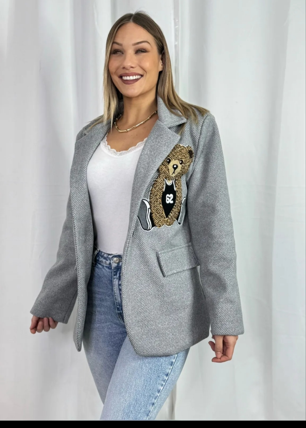 veste blazer avec écusson ourson matière